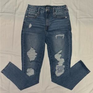 Dark blue ripped skinny jeans